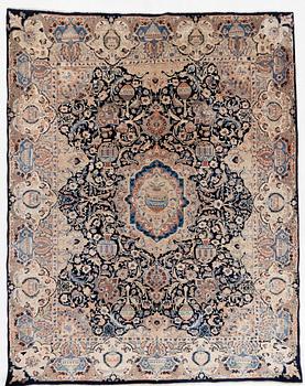 An oriental carpet, circa 387 x 301 cm.