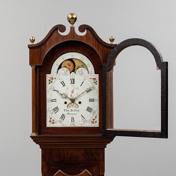 An English longcase clock, first half of the 19th century.