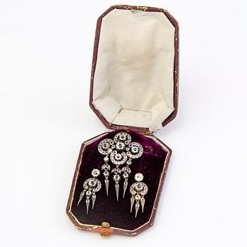 A set of silver earrings and a brooch with glass gems so called "Paste jewelry" Late 19th century.
