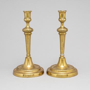 A pair of late 18th century candlesticks.