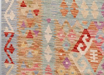 A Kilim carpet, ca 241 x 177 cm.