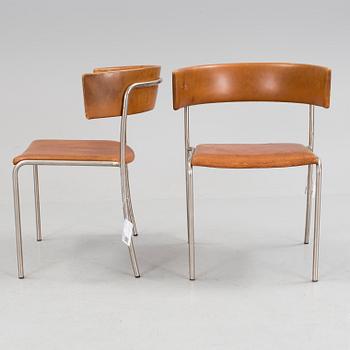 A pair of Erik Karlström leather upholstry chairs, circa 1965.