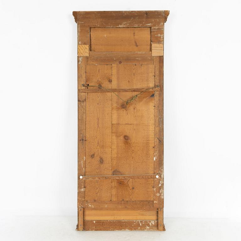 A late Gustavian giltwood and inset gouache mirror, circa 1800.