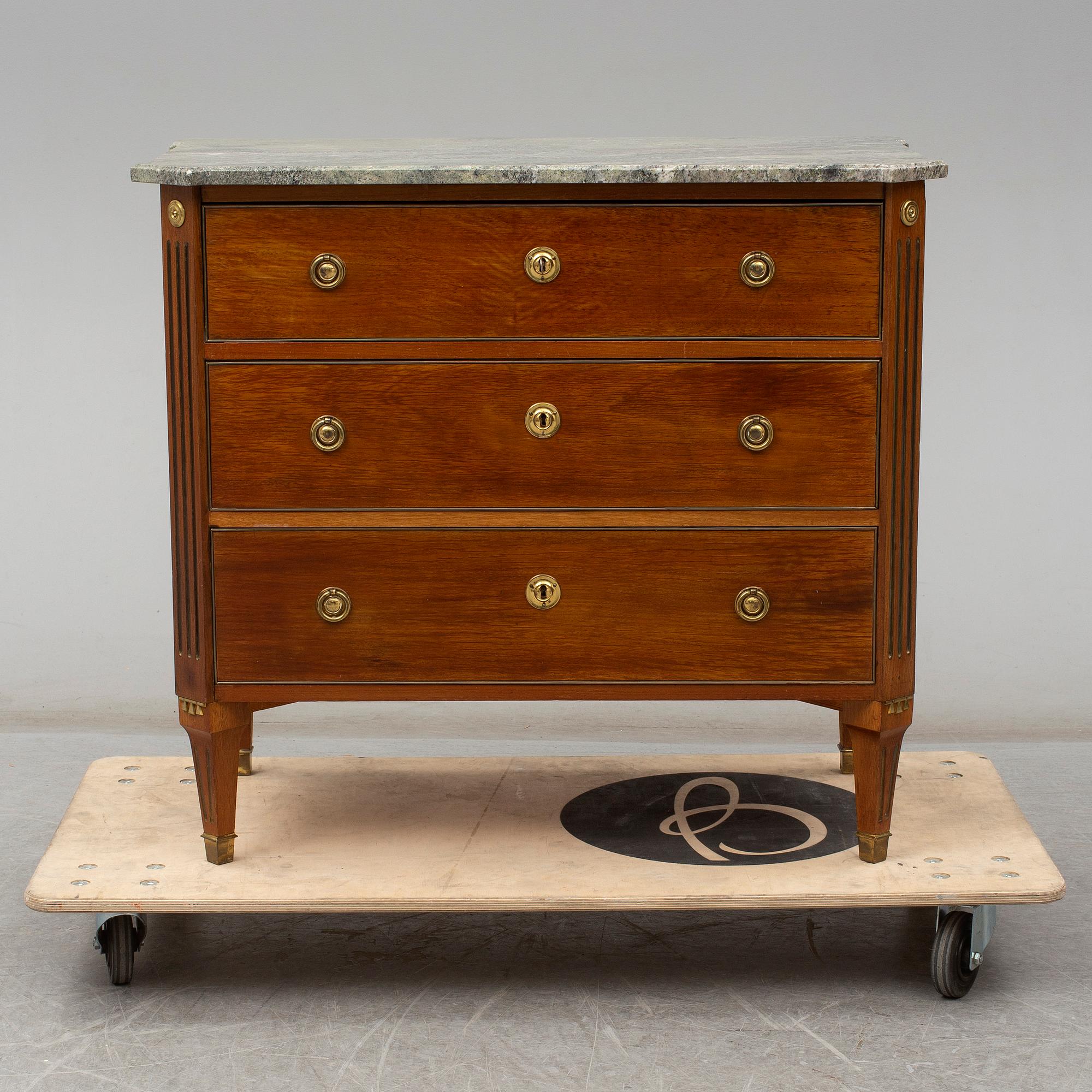 A mahogany veneered late Gustavian style chest of drawers, mid 20th Century.