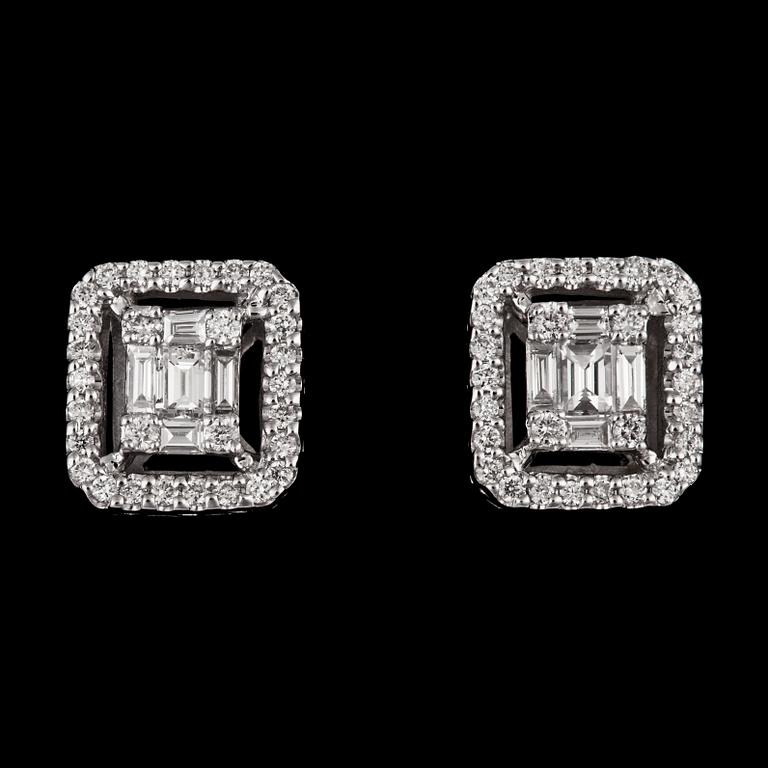 A pair of brilliant cut diamond earrings, tot. 0.57 cts.
