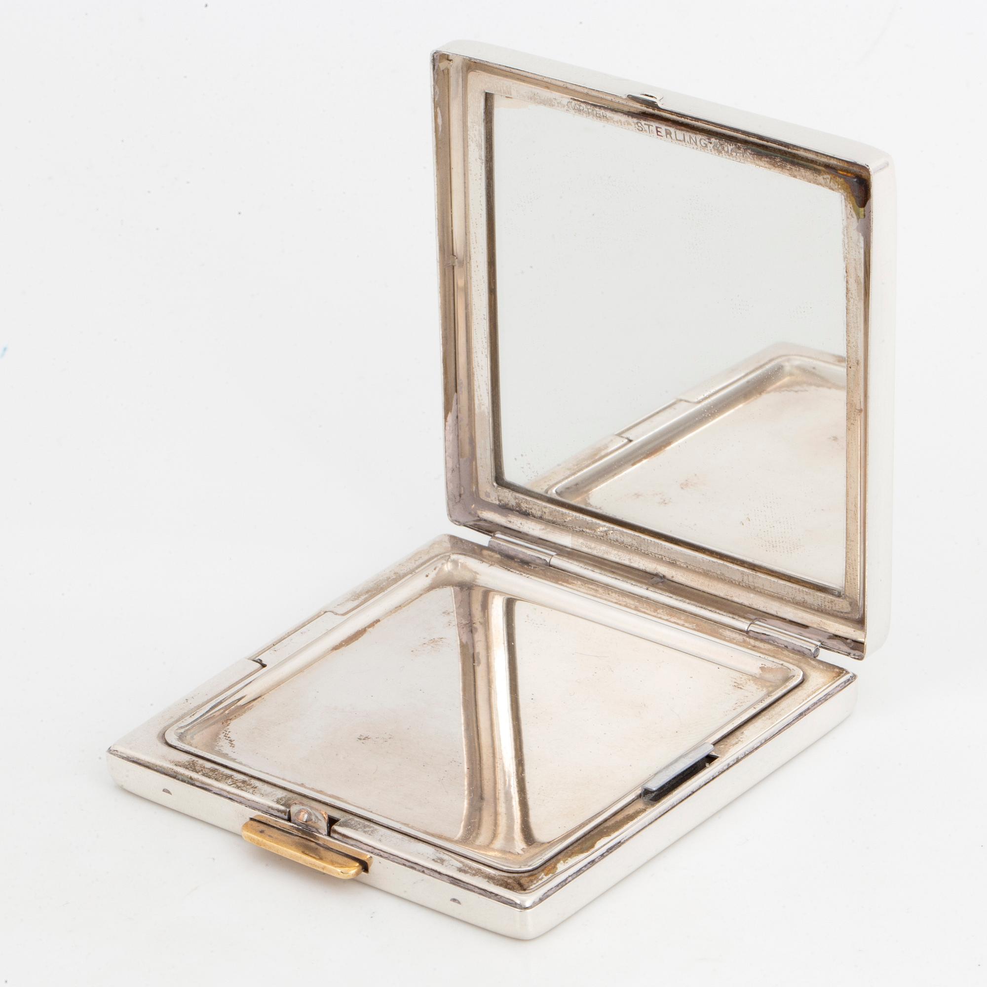 Puderdosa silver och 14K guld med fasettslipade safirer.