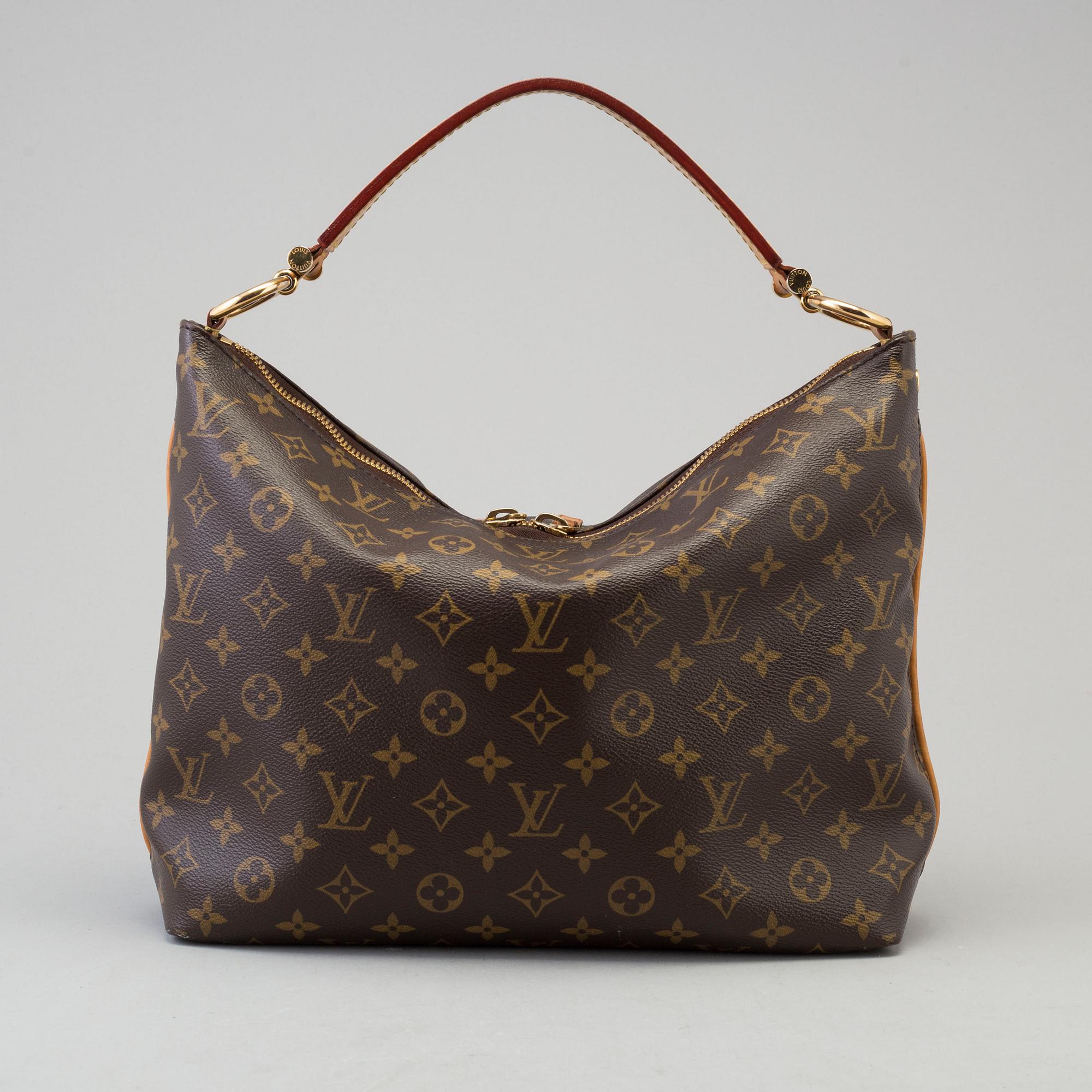 a LOUIS VUITTON 'Sully PM' bag.