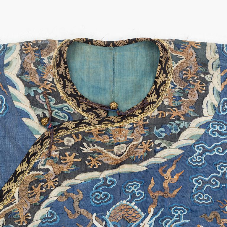 A five clawed dragon kesi robe on blue ground, Jifu, Qing dynasty, 19th Century.