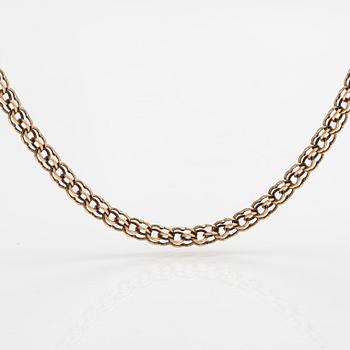 A 14K gold necklace. Aittamäki Ky, Nurmisjärvi 1992.