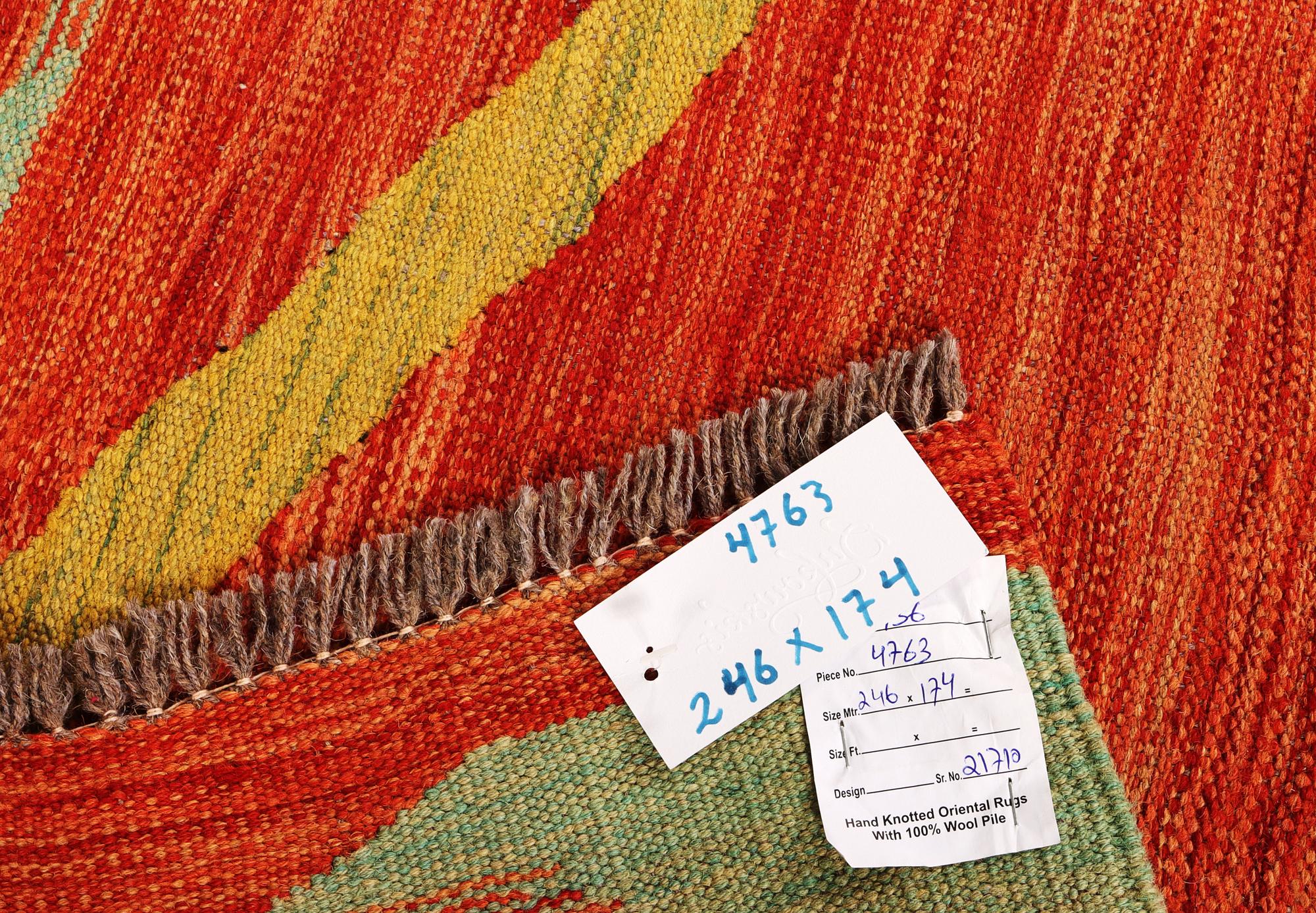 A Kilim rug, a. 246 x 174 cm.