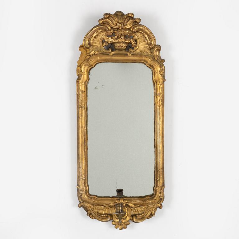 A Rococo mirror sconce, 18th Century.