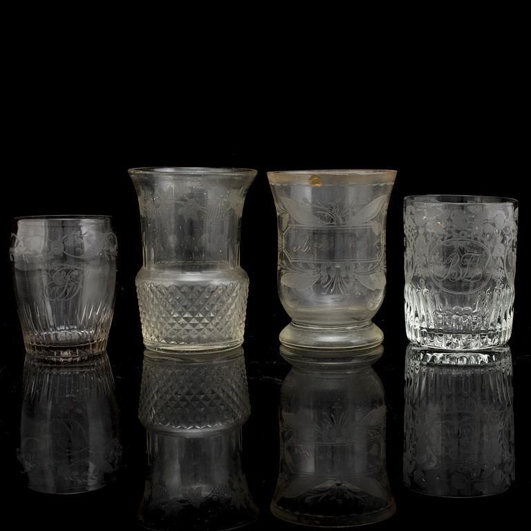 A set of four odd beaker glases, 19th Century.