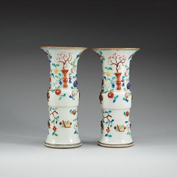 A pair of famille rose vases, Qing dynasty.
