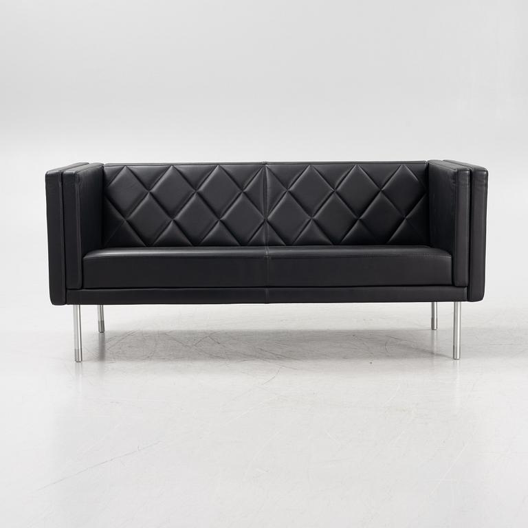 A leather upholstered sofa, 21st Century.