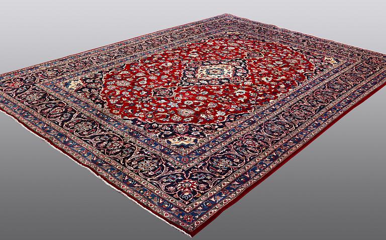 A carpet, Mashad, ca 346 x 248 cm.