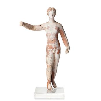 A Greek terracottta scultpure of Eros, Hellenistic period, Canosa, probably circa 3rd Century A.D.