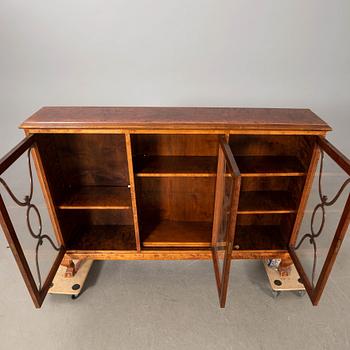 Display cabinet, 1920s.