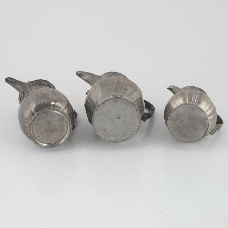 Three Rococo pewter coffee pots, 18th century.