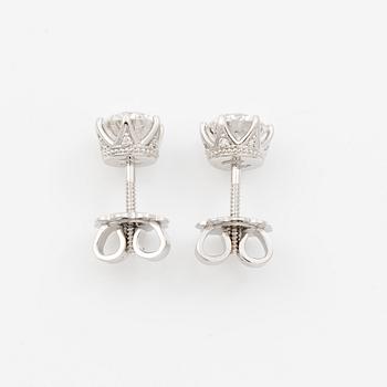 Earrings, single-stone earrings in 18K white gold with brilliant-cut diamonds, accompanied by IGI report.