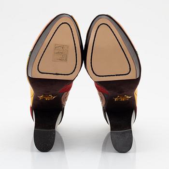 Charlotte Olympia, a pair of leather, suede and wood pumps, size 36.