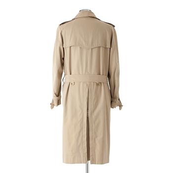 BURBERRY, a beige cotton trenchcoat.