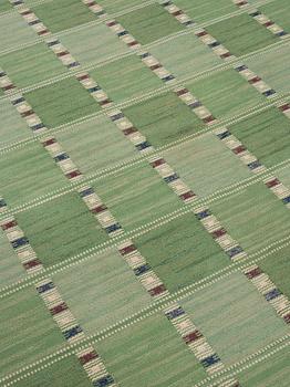 CARPET. "Falurutan Grön, Folksam". Flat weave. 301 x 186 cm. Signed AB MMF BN.