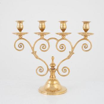 A brass candelabra, Skultuna Messingsbruk, Sweden, 1989.