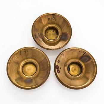 Maija Heikinheimo, a set of three mid-20th century brass underlay for tealight, Valaistustyö for Artek.