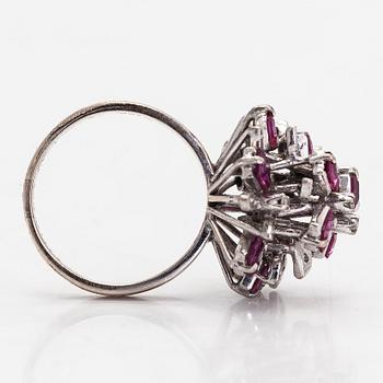 An 18K white gold ring with rubies approx 2.4 ct in total and eight-cut diamonds.