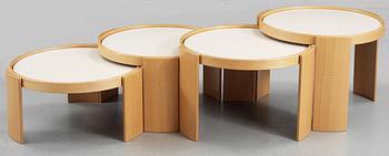 A Gianfranco Frattini stacking tables, (four pieces) with beech and laminate tops, by Cassina, Italy.