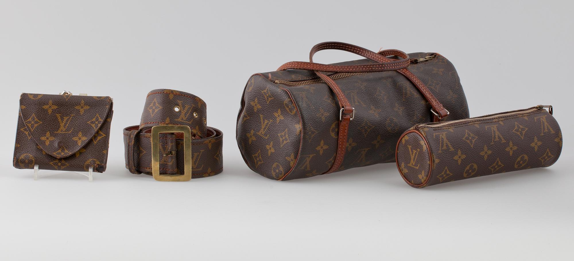 A Louis Vuiton four piece set.