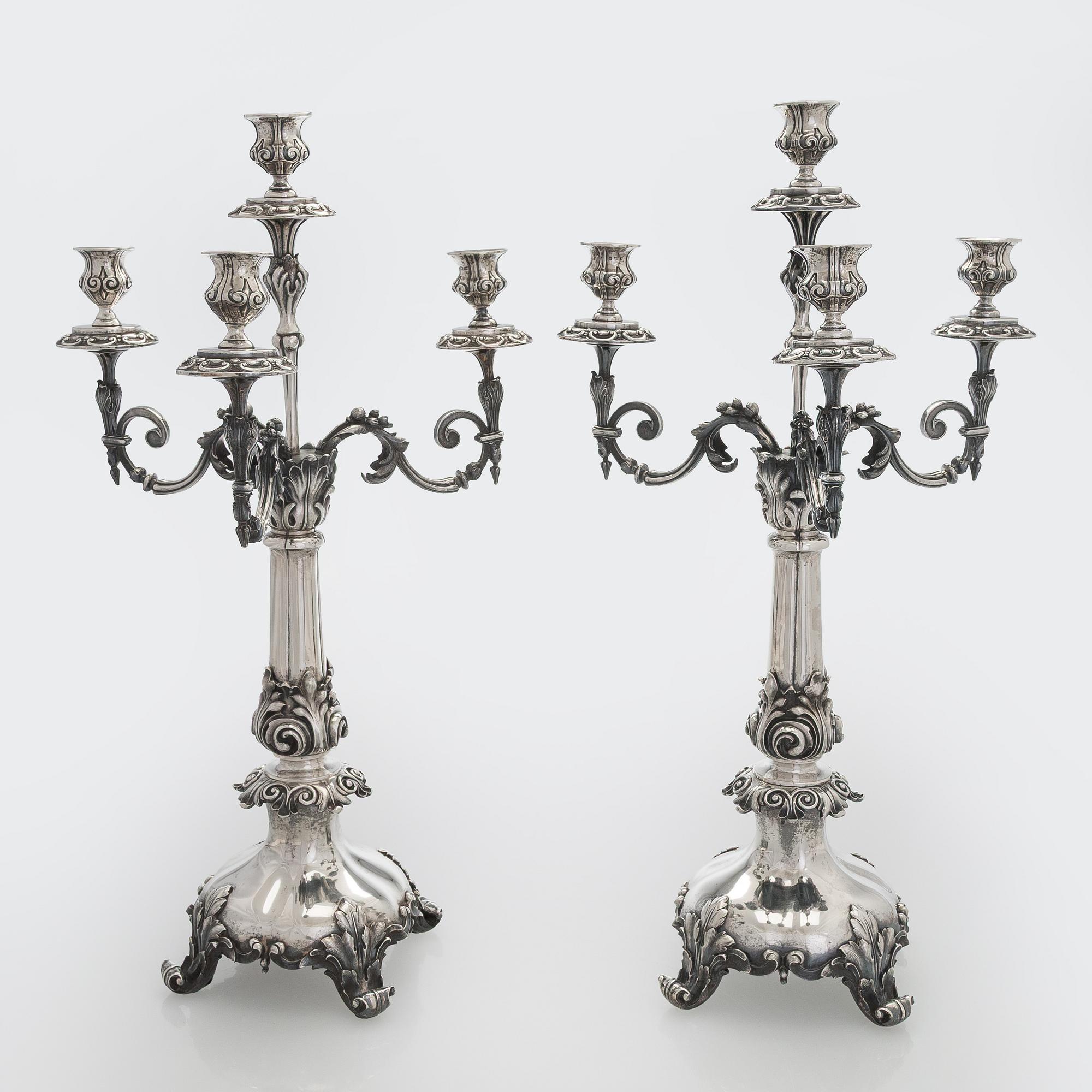 A pair of silver candelabra, maker marks of Carl Johan Tegelsten, Saint Petersburg 1850.
