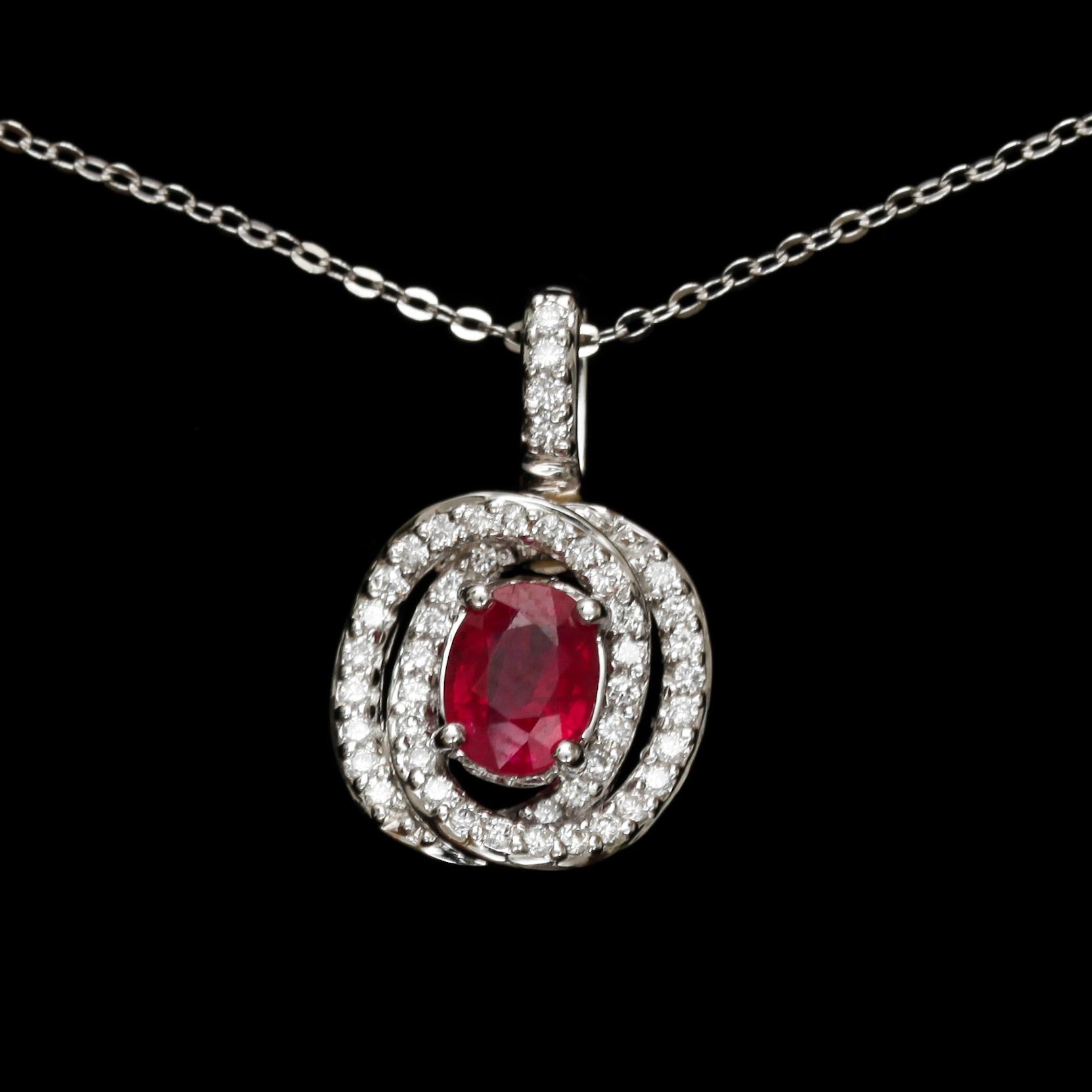 HÄNGE med KEDJA, 14k vitguld med briljantslipade diamanter tot ca 0,40 ct samt  rubin. Vikt 3 g.