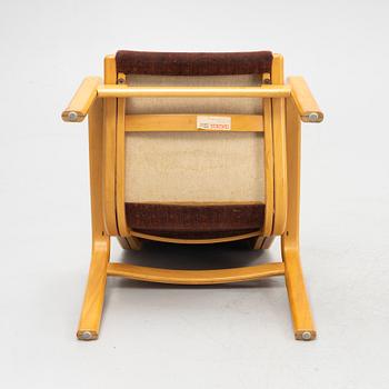 Yngve Ekström, a pair of armchairs, Swedese, late 20th century.