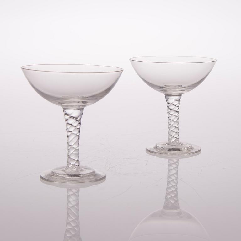 A set of twelve liqueur glasses from the first half of the 20th century.