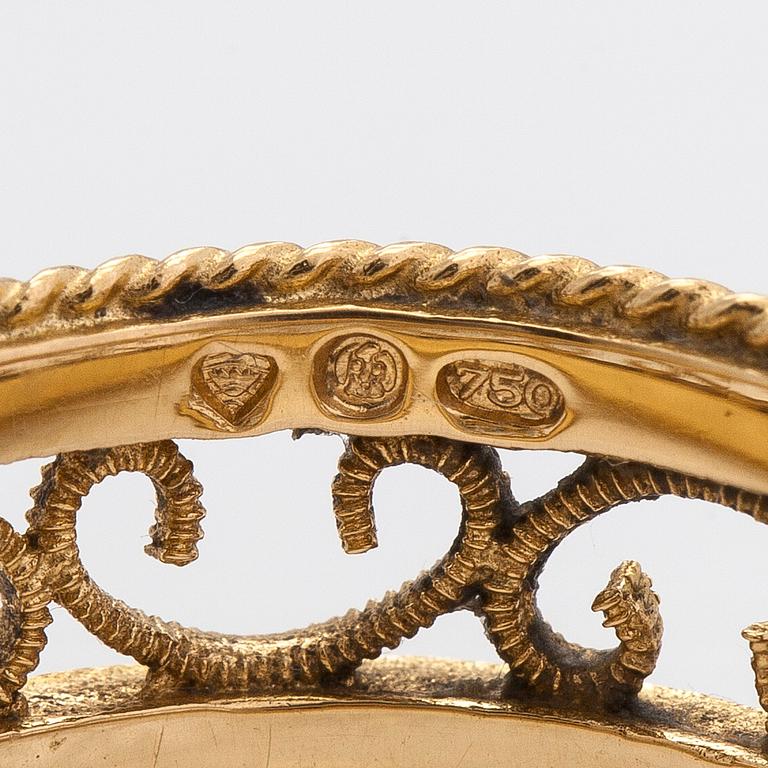 Kalevala Koru, an 18K gold 'Filigree' ring.