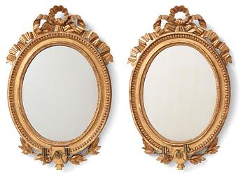 108. A Gustavian two light girandole mirror. (later copy will follow the lot).