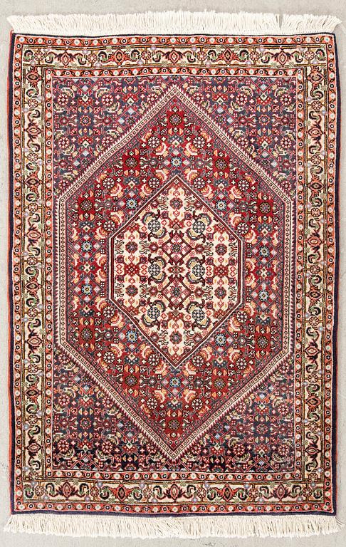 An old Bidjar carpet approx 100x71 cm.