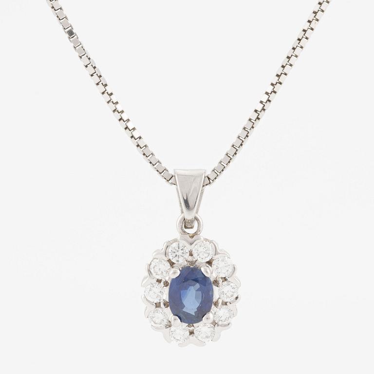 Hänge med kedja 18K guld med en safir och runda briljantslipade diamanter.