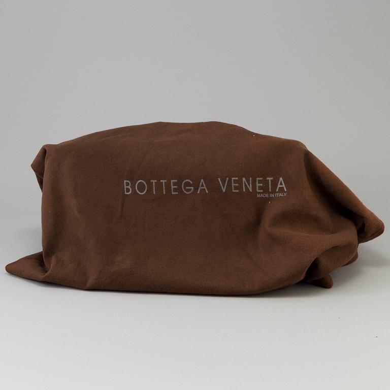 A bag by Bottega Veneta.