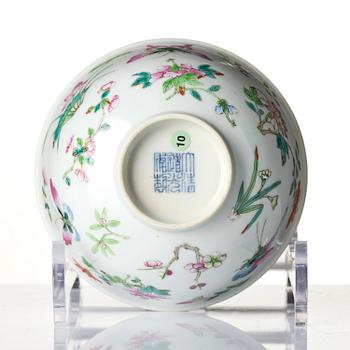 A famille rose 'butterfly' bowl, Qing dynasty with Daoguang mark and of the period (1820-1850).