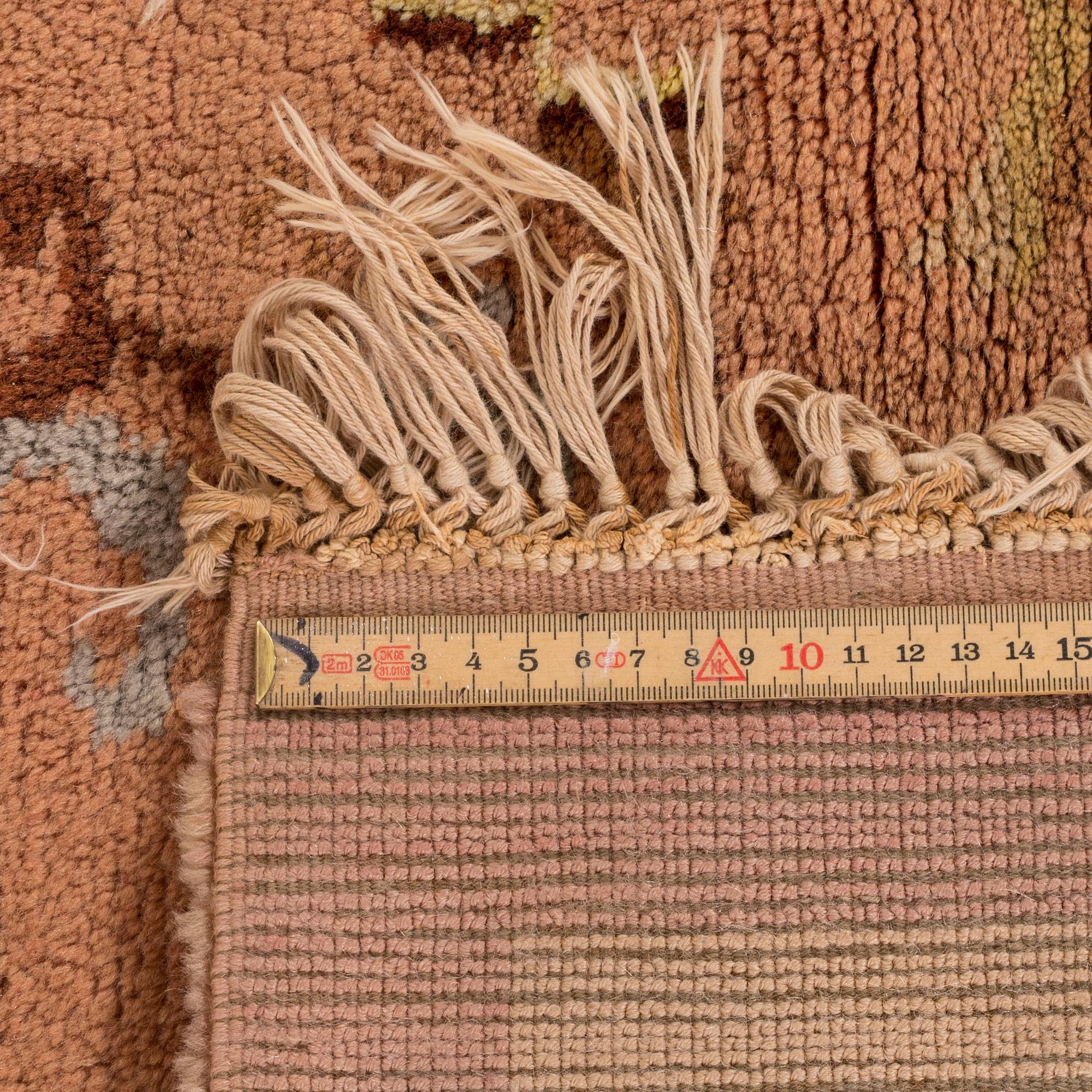 A Scandinavian knotted pile rug  1940/50 ca 303 x 169 cm.