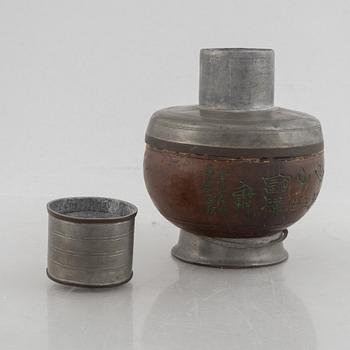 A Chinese pewter and wood tea caddie, early 20th century.