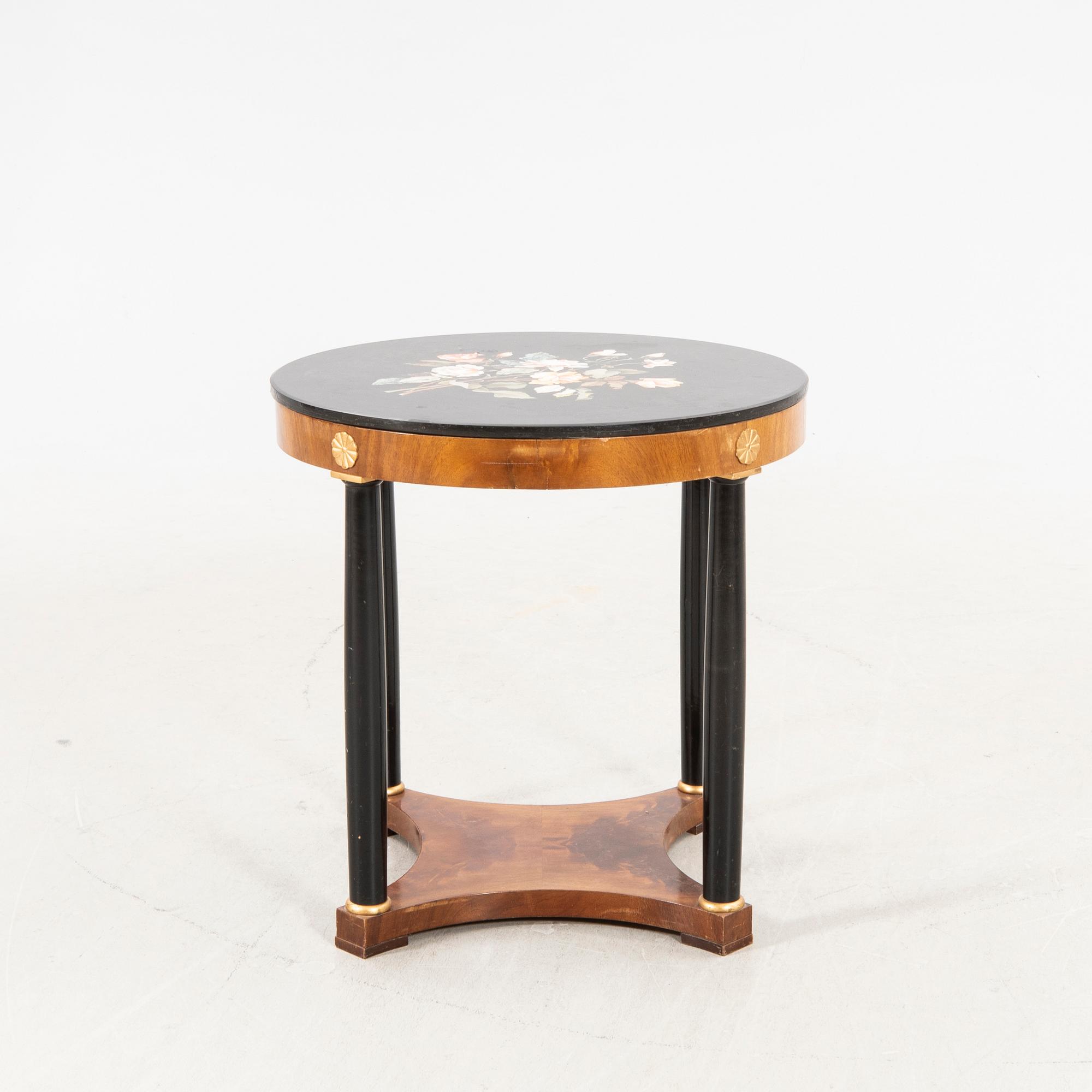 An empire style table with pietradura top around 1900.