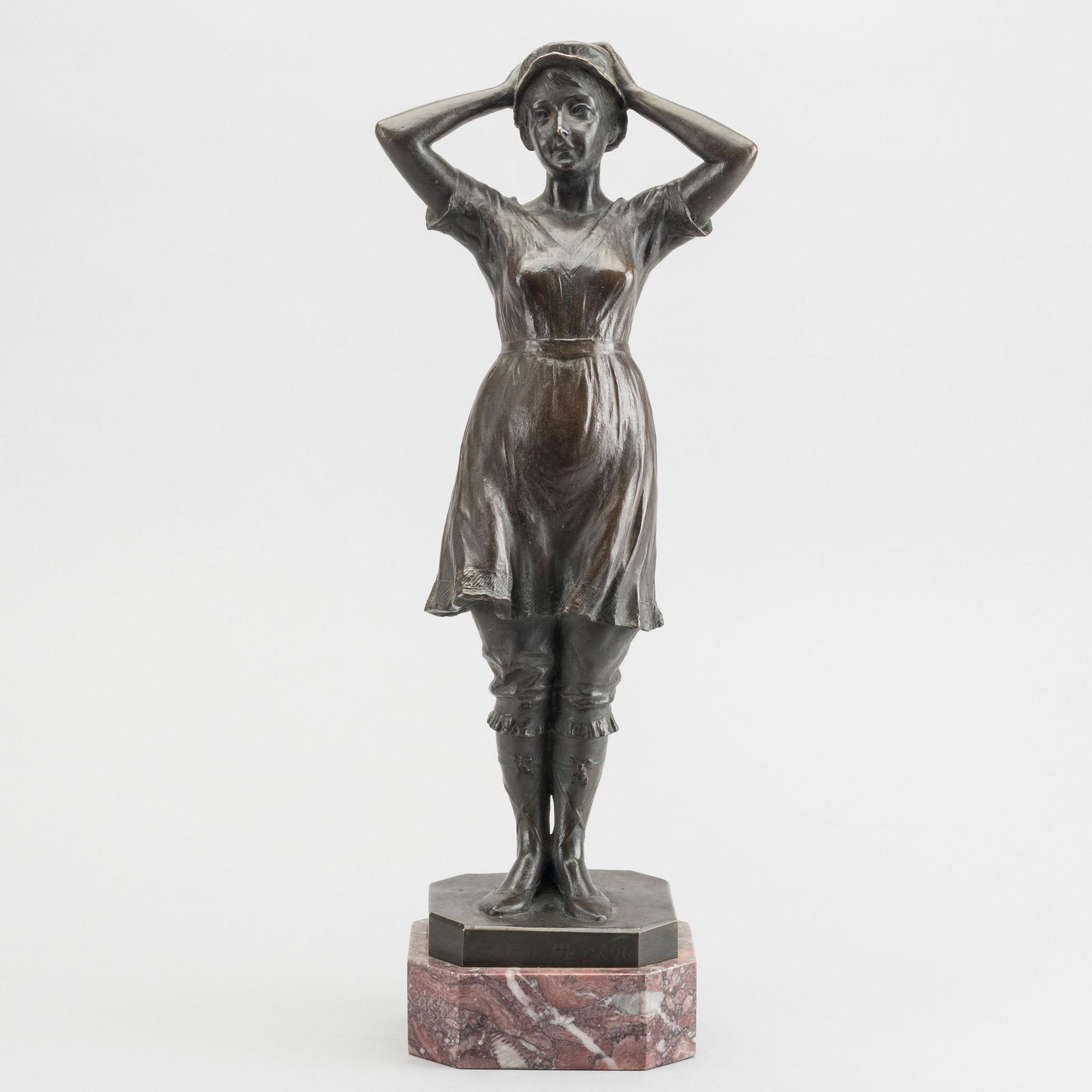 HUGO HECK, a signed and dated bronze sculpture.