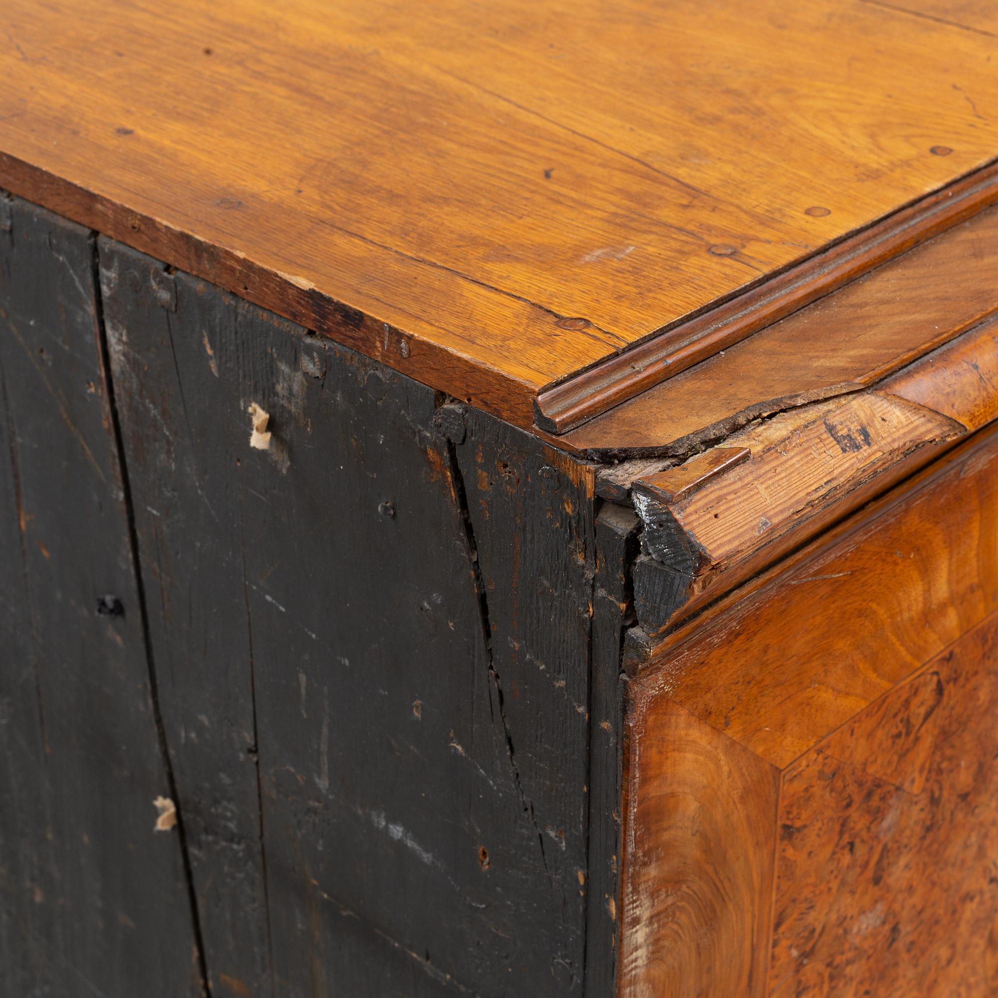 A Swedish root veneered late baroque chest of drawers, first half of the 18th century.