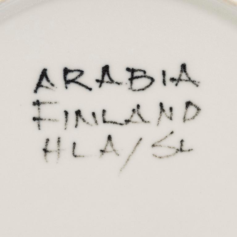 Hilkka-Liisa Ahola, a ceramic serving dish and ten side plates, signed HLA, Arabia Finland.