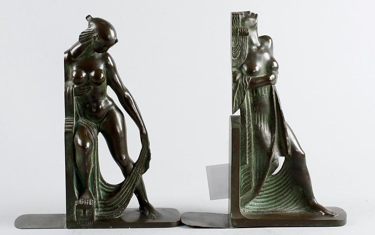 A pair of Axel Gute patinated bronze bookends, Herman Bergman, Sweden 1920's.