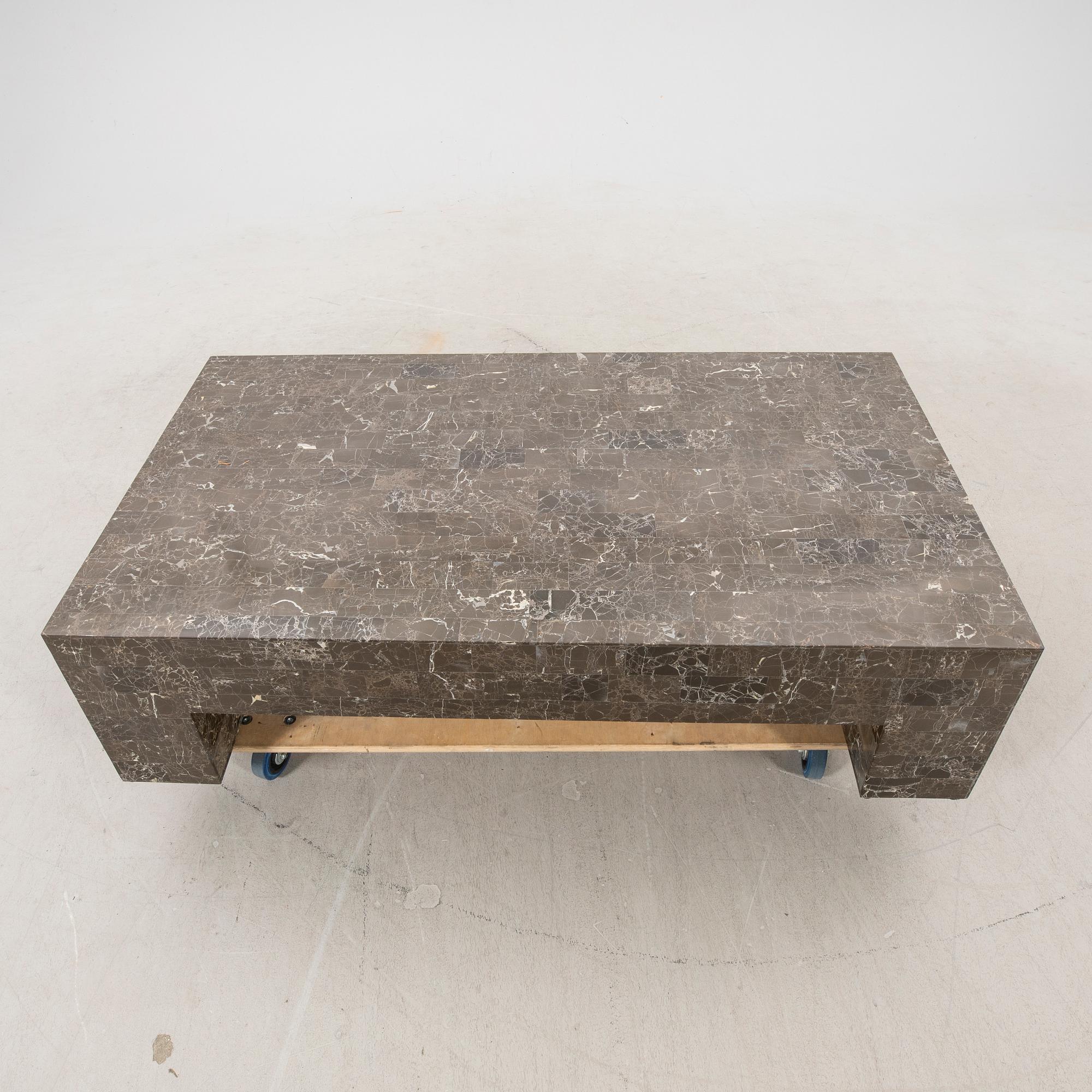 A travertine veneered coffee table later part of the 20th century.