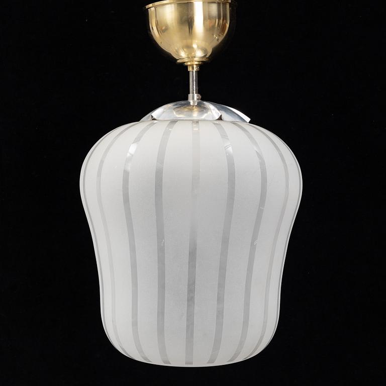A Swedish Modern glass and brass ceiling light, Orrefors, 1940's.
